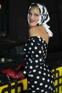 Alia has extensive qualifications and training. She has a Diploma in Speech and Drama with Trinity College London, theatre training with The Victorian Theatre with Dennis Drysdale and has competed in speech and drama Eisteddfod’s since the age of five, winning over 100 awards. Her vocal coaching is in both jazz and classical training. Alia has also worked as a model competing in the 2009 Miss Universe Pageant and as the Dealeret TV host for the game show Deal or No Deal with Andrew O’Keef. Alia has been titled “The Aussie Sensation”, in the global coffee club book “Marilyn’s are a Guys Best Friend” by Joseph Clough. Her experience spans corporate, theatre television and private parties: Crown Casino Melbourne, The Events Centre Perth, Flemington Racecourse Melbourne, Sydney’s Lord Mayor Ball, The Sydney Military Ball, The Regent Theatre Ball Room Melbourne, The Beyond Blue Ball, Yarra Trams TVC, RT Edwards TVC, ANZ, Bank of Melbourne, Campbell Point House Mansion, JGCOil. Alia has impressed crowds from all over Australia, with over 100 appearances. Alia as Marilyn Monroe will impress your guests with her established live vocal singing, her authentic dance moves and extravagant Marilyn Monroe costumes.